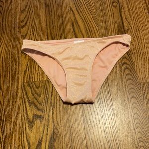 Pink sparkly women’s target bikini bottoms.